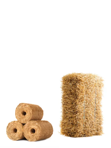 Fuel briquettes of straw  isolated on a white background — Stock Photo, Image