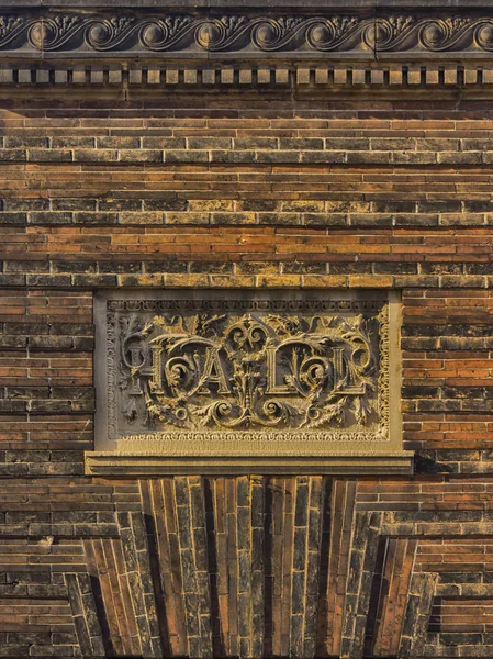 Ornate sign on old building