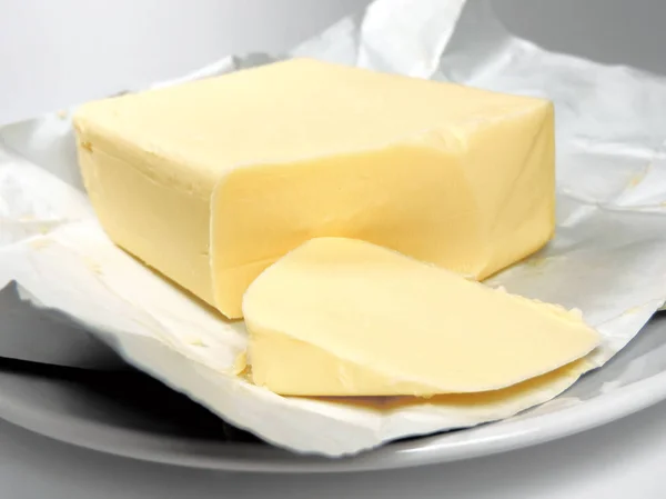 Piece of fresh butter — Stock Photo, Image