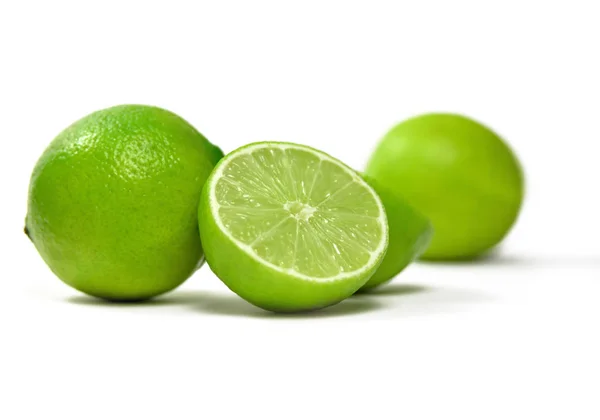 Fresh limes, isolated on white — Stock Photo, Image