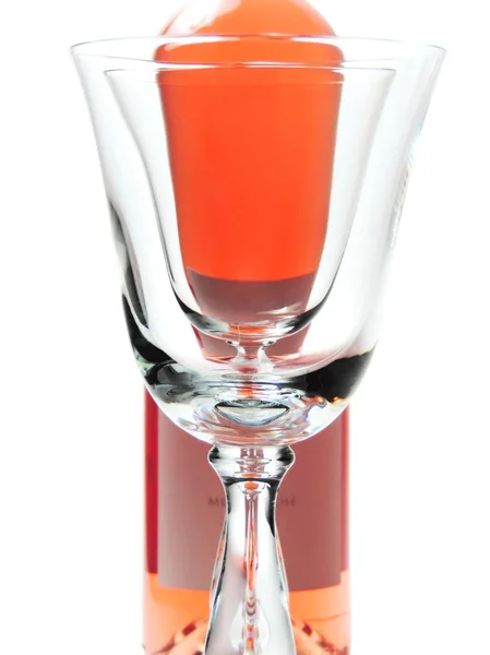 Wine bottle and elegant wine glass — Stock Photo, Image