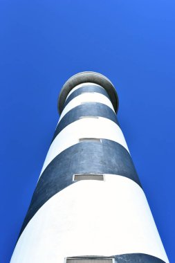 Black and white striped lighthouse or beacon clipart