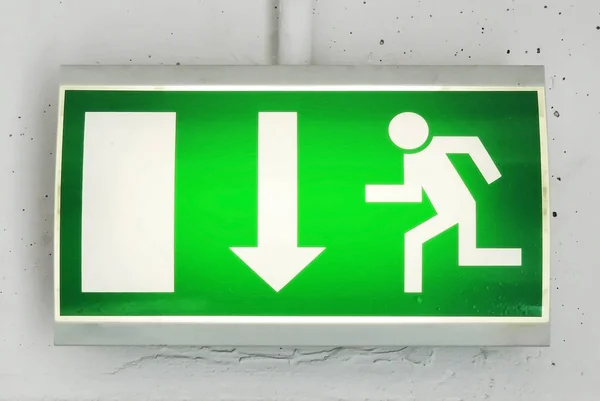 stock image Green emergency sign with pictogram