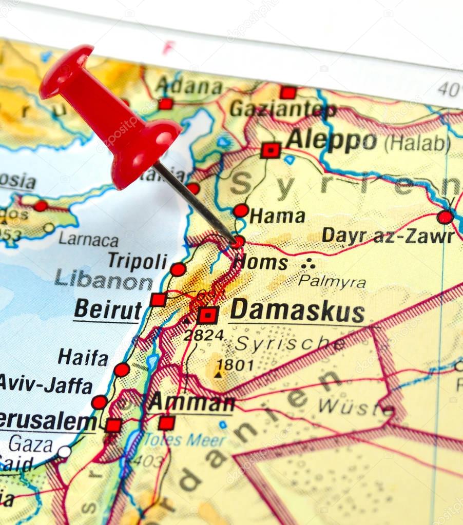 Syria with pin set on Homs