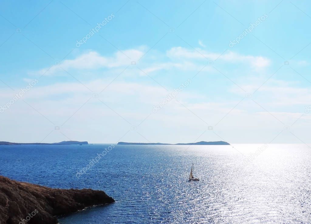 Sparkling sea scene with sailing ship 