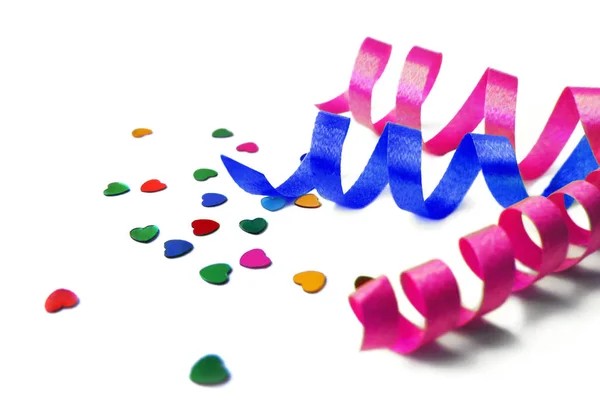 Curly ribbon and confetti, party decoration — Stock Photo, Image