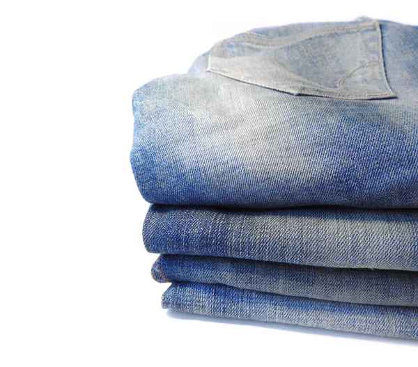 Folded blue jeans, jeans stack — Stock Photo, Image