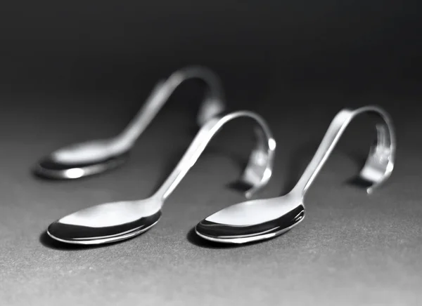 Elegant silver spoons in a row — Stock Photo, Image