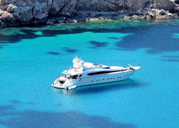 Luxury yacht, anchored in a beautiful bay