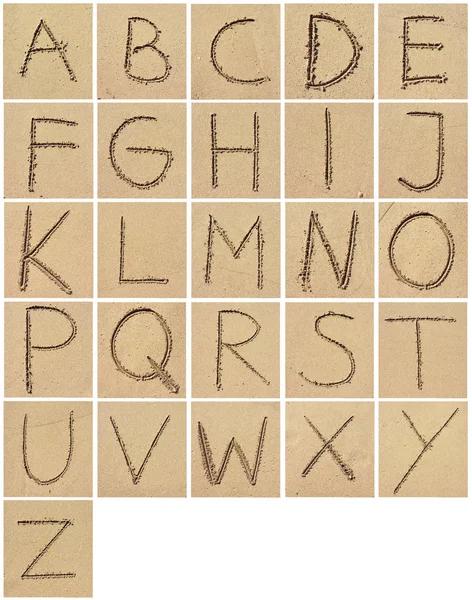 Alphabet letters, written in the sand — Stock Photo, Image