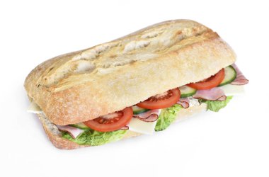 Lezzetli ciabatta sandviç jambon, domates, taze salata ve salatalık ile 