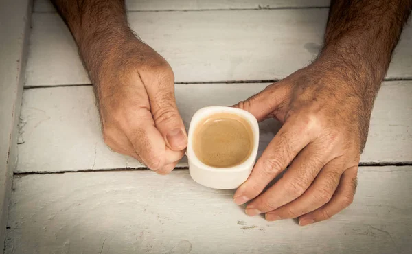 Holding cup of coffe — Stock Photo, Image