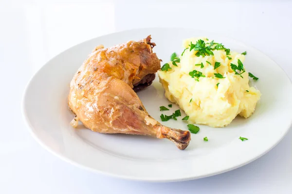 Chicken drumstick with potato — Stock Photo, Image