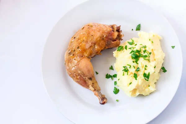 Chicken drumstick with potato — Stock Photo, Image