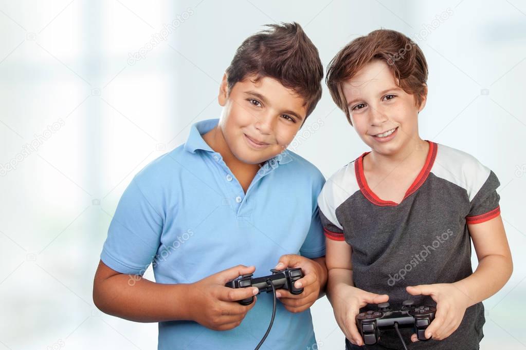 Happy boys playing video games