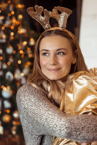 Pretty woman with Christmas gift — Stock Photo, Image