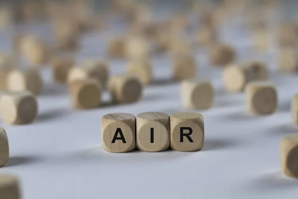 Cubo de ar com letras, sinal com cubos de madeira — Fotografia de Stock