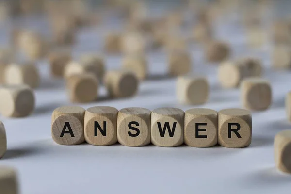 Answer   cube with letters, sign with wooden cubes — Stock Photo, Image