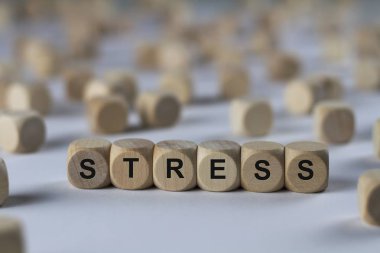 stress   cube with letters, sign with wooden cubes clipart