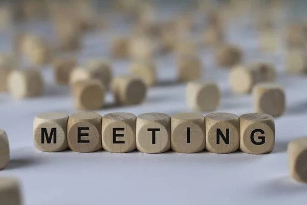 Cubo de reunião com letras, sinal com cubos de madeira — Fotografia de Stock