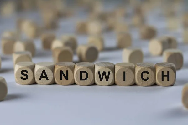Sandwich moduł z literami, zalogować się za pomocą drewnianych kostek — Zdjęcie stockowe