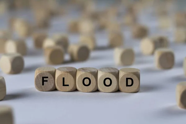 Flood   cube with letters, sign with wooden cubes — Stock Photo, Image