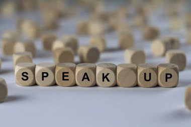 speak up   cube with letters, sign with wooden cubes clipart