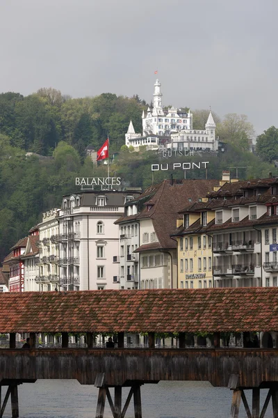 Gutsch castle towering over buildings in Lucerne — Stock Photo, Image