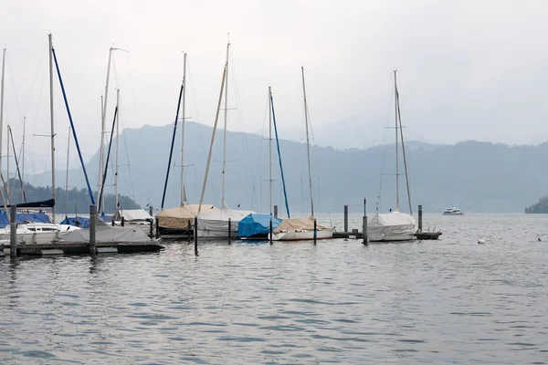 Moored sailboats in the small marina — Stock Photo, Image