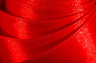 Dekoratif kırmızı kurdele bir arka plan oluşturur