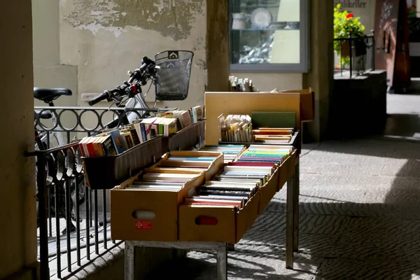 Colorful books in cardboard boxes — Stock Photo, Image