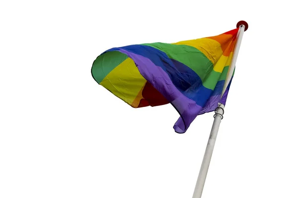 A rainbow flag is placed on the mast