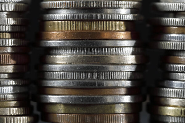 A pile of coins shown close up