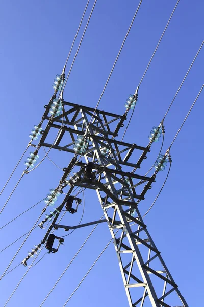 Modern electric tower on blue sky — Stock Photo, Image