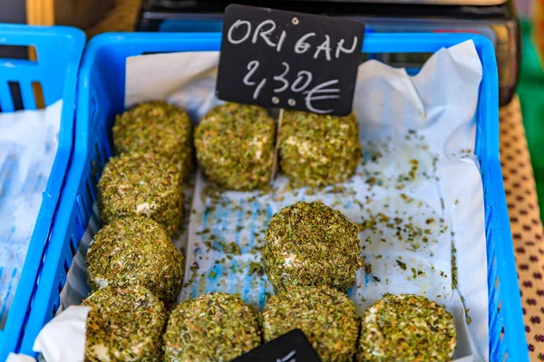 Herb coated cheese at a farmers market in Nice France — Stock Photo, Image