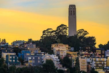 Famous San Francisco Coit Tower on Telegraph Hill at sunset clipart