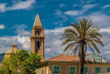 Bell tower of Cattedrale di Santa Maria Assunta and houses in Ventimiglia Italy old town just across from French border