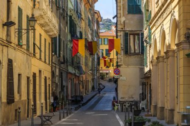Colorful old buildings of a hilltop medieval town of Ventimiglia in Italy across from the French border