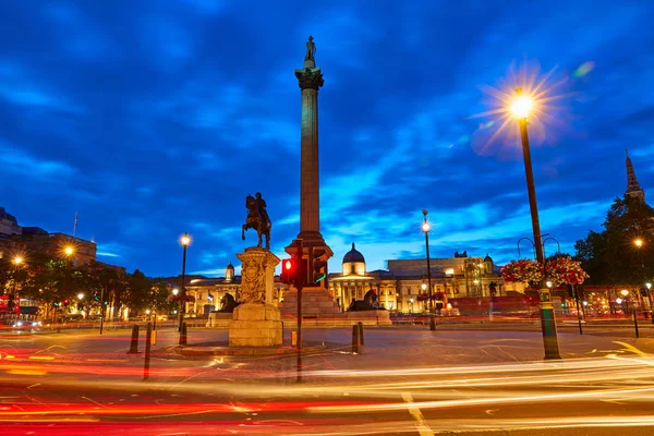 London Trafalgar Square pôr do sol coluna Nelson — Fotografia de Stock