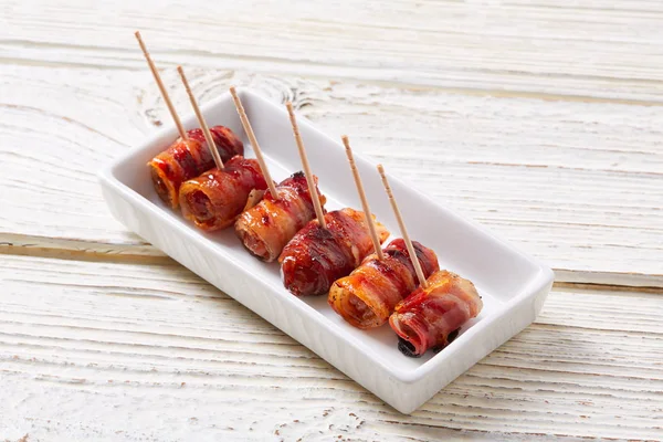 Pinchos Bacon wrapped dates pintxos tapas — Stock Photo, Image