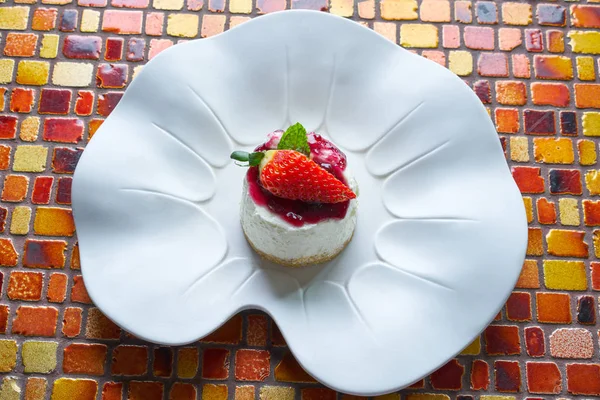 Cheesecake with cranberries sauce — Stock Photo, Image