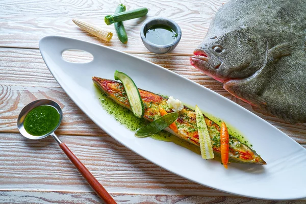 Grilled turbot over wild asparagus — Stock Photo, Image