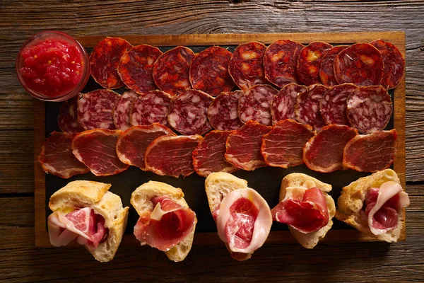 Iberian sausages ham board Tapas from spain — Stock Photo, Image
