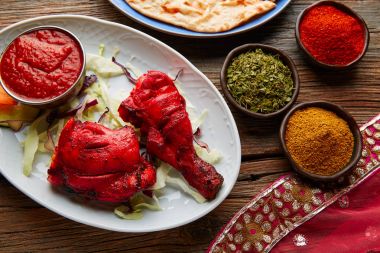 Chicken Tandoori indian recipe with spices clipart