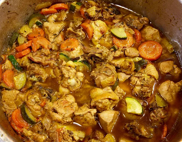 Chicken stew in a restaurant pan — Stock Photo, Image