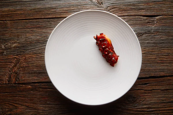 Grilled octopus with parsley air foam chef — Stock Photo, Image