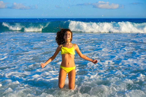 Bikini girl jumping in Caribbean sunset beach — Stock Photo, Image