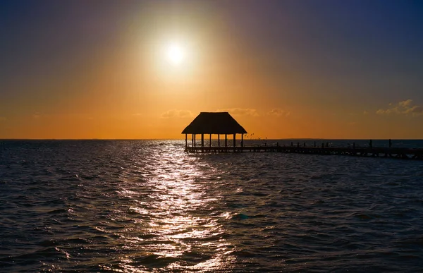 Holbox island sunset beach pier hut Mexikó — Stock Fotó