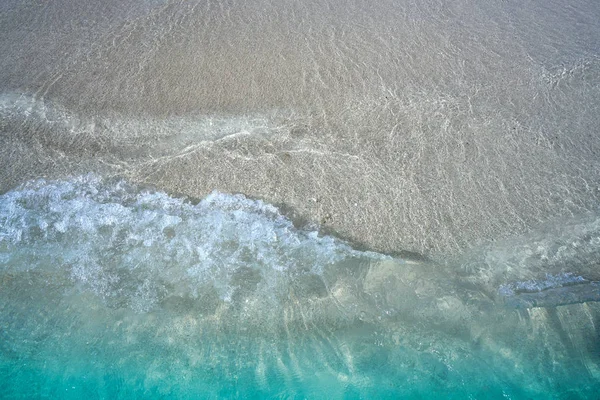 Playa caribeña textura de agua turquesa —  Fotos de Stock