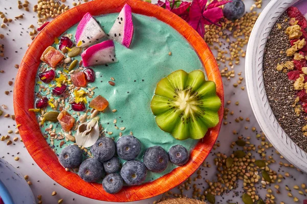Acai bowl smoothie with kiwi blueberry seeds — Stock Photo, Image